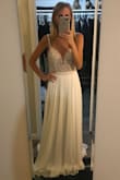 Oh how I wanted to love the "most loved" wedding dress on all of Lulus... but sadly, it wasn't for me.
Pros: + based on other reviews, the dress clearly looks fabulous in photos. In person, I can verify it looks good from a few steps back.
+ the fit was good although, like others have said, I would have needed to hem the bottom and/ or take up the sleeves
+ for a wedding dress, the price is phenomenal.
Cons: - up close, the top looks super cheap/ low quality (feels like a home ec project/ prom dress).
- as someone with a small bust, the top didn't look super flattering, adding to the feel of a teenager prom dress (rather than a woman's wedding dress)
So sad to have to send this back, but I hope it looks better on you than me. - Philippa L.