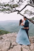 This dress was everything I hoped it would be. We took our photos on a windy day & they were EPIC. The lining of the dress added quality & the wrap was perfect for being a bit busty & a larger Gal. (I put a white sports bra underneath & it made it modest & classy.) So comfortable & fabulous!! - Ainslee W.