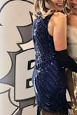 This was the perfect dress for NYE Roaring 20's Party! Received compliments throughout the night. A few pieces of fringe string at the bottom of the dress become uneven that I pulled out but not a big deal. - Tabitha T.