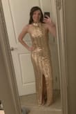 I am always hesitant to purchase long dresses due to my short stature but with some tasteful 2 in heels this dress was the perfect length, no tripping! I did have to pin the back since it was a tad loose but nothing a gold safety pin couldn't fix! So many compliments and felt so comfortable! - Shannonn N.