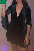 Fit really well and I found it super flattering. Loved the dark green and the sleeves were fun to dance with - Sophia P.