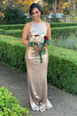This dress was so beautiful. I loved it! I usually wear size small but this was a tiny bit loose. I could have worn an XS for a perfect fit. It was very comfortable and I received a lot of compliments. It is very long. I wore pretty tall heels and still could have gotten it hemmed. - Alyssa C.