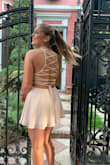 Nicer than the pic.I have to mention that Lulus staff via chat was very helpful to chose the right size so I strongly advise to talk to them if you have any doubt about the size. It was not the first dress for my daughter, but I have to say that they always exceeded my expectations. Thank you Lulus. - Graciela S.
