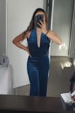 I never write reviews but felt the need to after trying this on! I'm pretty petite so it can be tough finding something that would accentuate my curves. This jumpsuit fit like a glove and it's SO comfy. I may need to get it hemmed since it's a bit long on me but I think this was money well spent, it's definitely my favorite thing in my closet now :) - Mikha S.