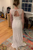 The cut and fabric on this dress was relatively flattering, but after trying on I felt the style was a bit too cutesy and early-2000s for a modern wedding dress. Returned. - Alison M.