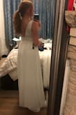This dress is beautiful and a flattering cut. Only complaints are (1) it's way too long (completely on the floor even in 4" heels) and (2) it's a bit see-through (you could wear nude underwear and it would be fine but any other color would be noticeable). The bottom has 4 different layers so hemming this would be a bit expensive so I returned it but otherwise I really loved the dress. - Kacey W.