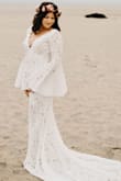 I love this dress with everything I have! The top WAS. A little large for me, but I am small busted. The rest fit my curves like a glove. Did not need to hem it either. I wore it for a beach elopement, and it was the most perfect dress. I felt like a boho bride dream come true! - Gabrielle R.