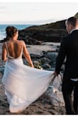 I felt like a princess! I could not have been happier with this dress. It made the perfect wedding dress and I received so many compliments. It was true to size and needed 0 alterations (except hemming it a bit since I'm only 5'1). I look at my dress and just smile now, the memories will last a lifetime! I'd highly recommend this dress to any bride-to-be. Comfortable, great quality, and absolutely gorgeous in pictures! - Beth B.