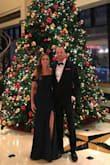 The green is gorgeous!!! Not as dark as it looks in the photo, more green and it's beautiful! Dress fits perfectly! Stretchy around arms so not too constricting. But dress also holds shape all night! Received so many compliments! Everyone should buy this dress! - Catherine F.