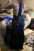 I have a black-tie wedding to attend in May and am on a budget these days, so I grabbed this dress while it was marked down and I also had a 15% coupon. I was nervous about buying a longer/maxi dress online... seeing that I am on the shorter side and typically have to pay to get the length of my dresses altered. I'm also in between sizes (waist is a Xs/S (0-2) and hips are a S/M (4-6)...) so I hoped it would hug me in the right places.... and it DID! It has just enough stretch/give that it fits my waist and hips perfectly without feeling restricted... AND with a 3 inch heel, I don't even think I need to get the length of it altered NOT typical for me! Extremely happy with this purchase Oh, and the back is super elegant! Can go braless for sure - Jessica
