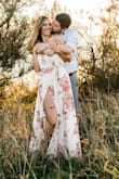 Wore this dress for our engagement pics and it was PERFECT. It is quite long, I wore 3 inch heels and it still dragged on the ground a little. I originally ordered a small but had to size up because of my bust. - Taylor L.