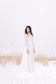 I'm a photographer so I purchased this gown for styled shoots. It was a little big for my 5'2 15 year old model but still looked great, and a little short for my 5'9 model but looked stunning. The size is flexible and the style is flattering on all types. Highly recommend!! - Trisha S.