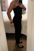 This is the first jumpsuit I've ever tried on, and I was nervous to purchase online. Lulus return policy is fantastic, though, so I figured "why not?" This piece fits me like a glove! Highlights my curves without accentuating my tummy area, which I'm always self conscious about. I said it runs a little large because while it fits me like a glove, it should be too small according to the size chart. Per the size chart, a small fits a 33"-34" bust (I'm 34A/B), which makes sense (btw I am seriously small chested, and this never fell down all night), 26"-27" waist (I'm 29" waist). and 36"-37" hips (I'm 40"). I did hem it about /2". I loved the tighter fit, and it was very comfortable. So glad I took the leap! - Jennifer Z.