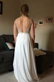 I purchased this dress to try on for my intimate beach wedding ceremony. I love the beading on the top and the flowy skirt. It's definitely a contender, but I'm not 100% certain it's 'THE' dress yet! - Katelyn E.