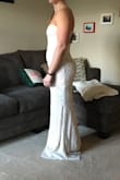 I purchased this dress to try on for my upcoming intimate beach wedding ceremony. It currently feels a little snug on me and I will probably need to wear shape wear underneath, but I was pleasantly surprised by how much I like It in photos. - Katelyn E.