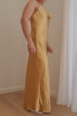 Beautiful fabric. Nice weight, true gold color, shiny and gorgeous. Maybe runs a little large, but it might also just depend how you want it to fit. I may re-order a small if they restock or have this one tailored a bit. - Karen H.