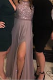 I had a wedding to go to and this dress was perfect for an appropriate, whimsical look with a touch of sexy due to the slit. I'm short (5ft) so the slit didn't go as high and I needed to get the dress hemmed so I wouldn't trip over all the excess material. It looks amazing and fit great - it wasn't itchy against my underarms where the sequins was. My only complaint is that the zipper was hard to zip up over where the fabric changes at the seam. This wasn't a size issue and I experienced this issue when the dress was off my body as well. - Anastasia C.