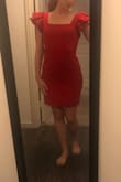 I wore this dress for a Christmas themed semi-formal. I received so many compliments throughout the night! You definitely will turn some heads wearing it! This dress is true to size and extremely comfortable. I was worried about it being tight around my thigh and bum area since I'm a little bit wider there, but it fit so well! It's form fitting and super flattering. The ruffles on the shoulders are adorable. - Emma F.