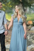 I wore this dress for my engagement photoshoot and I absolutely loved it! The dress is double lined so it is not see-through. The sleeves are non-slip and I love the support it has under the bust area! I did not wear a bra with my dress due to the low cut, but a sticky bra or tape would be a good idea next time for more support. I am about 5'7 and I wore 3in heels. The length was perfect and not difficult to walk in at all. I love how you can dress it up or dress it down depending on the occasion. - Olivia B.