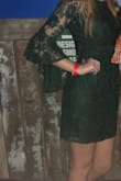 Fit pretty true to size, not as tight as a body con but not as loose as a fit and flare. Loved the flared sleeves and got compliments all night long! Lacey material was as expected - Maddie Z.
