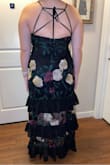 I'm wearing this dress to Mardi Gras and I was super impressed at how nice the fabric was and how well it fit. I didn't want anything super expensive because there is a lot of partying and I didn't want it to get ruined. It's also super fun and I know I will stand out! - Margaret C.