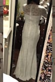I purchased this in an XS as a potential wedding dress. Very comfortable and runs true to size, but it wasn't the one so I returned it. I did love the long sleeves, but didn't love the high neck. - Angell