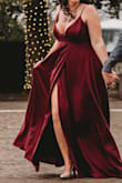 Wore this to my winter engagement photo shoot and it looked amazing in photos! The fabric was a good weight and quality, but I should note it wrinkles very easily. I steamed the dress for our photos and the car ride alone left me wrinkling again. The burgundy is more vibrant that shown on Lulus---which was not a bad thing, I actually preferred it. I usually have to buy up a size in clothing for my cup size, so the XL worked out perfectly for me. I received SO MANY compliments on this dress, with multiple strangers coming up to me. Super happy with my purchase! - Megan W.
