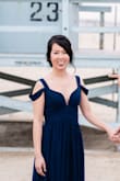 Love this dress. It looks and feels very beautiful. The burst area would pop if I wear the dress with a bra. It looks fine without a bra. To get it hemmed, you have to pay for two layers ($17 per layer) - LYNETH L.