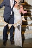 I wore this dress for my elopement ceremony. In the end I think it looked pretty good. I originally ordered it from Nordstrom, but the lace pattern so far off center it was odd looking. When I brought up my concern to Lulus directly when ordering another one, a Lulus representative said they would double check the pattern before sending it out. I only had a week til the ceremony so I was nervous! It worked out well as a stand in since I couldn't find a real wedding dress in time. I did have to take off 4" from the bottom as I am 5'2" and wore 3" heels. I played with the idea of wearing a trumpet crinoline. I liked the look, but decided against it. I will post photos both ways. It looks a bit more bridal with the petticoat. - Holly D.