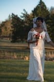 This dress was perfect for my intimate wedding. I bought another dress so that I could add sleeves and I also bought some beads and added to the waistline and around the neck and sleeves. I think it came out perfect! - Sherene S.
