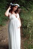 I bought this dress for a night of celebration with my husband, and I just loved it. I alter the "straps/vneck" a little bit because it was a little large and loose around my bust area. My twin sister wore it a year later for her maternity photos, so it works as a maternity dress as well! Also, the dress is a little long, but nothing a slight alteration or some heels couldn't fix! - Shauna W.
