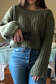 This top is modeled as an 'off the shoulder top, so I try off the shoulder and my hand was hidden by about 4 inches of material! Not to mention the side that wasn't off my shoulder, it was really long as well. This is extra disappointing because it's the second item in my purchase that didn't work in my favor. I follow the measurements and read reviews so I purchased the small. Ugh so wish I got an extra small.. Team Lulu please help - Delanie B.