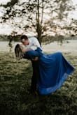 I wanted a dramatic look for my engagement photos and this dress was just the ticket! Doing lots of Blues in my wedding so I wanted my engagement photos to have a pop of blue. It fit perfectly in the waist and had a great flow-y look to it. It was a tad tight in the armpits and biceps, but I have an athletic build and some muscle there, so it's not anything I'm not used to. The thigh slit goes on for days, so I recommend not wearing any short-style undergarments and go for just underwear! - Sarah M.