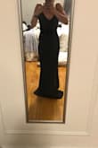 Absolutely loved the top half of this dress (neckline, back, down to the waist). So elegant and classy. But, HOLY fabric. This dress is so thick, I was hot just trying it on. Never mind the fact that I had a solid 6 inches of fabric hanging at the bottom. From the side, it looked as if I was wearing thick black gaucho pants. Had to return. - Rebecca R.