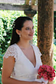 So in love with this dress - was perfect for our intimate outdoor wedding ceremony. The lace detail on the top of the dress is so beautiful and the skirt was the perfect amount of flowy without being heavy. The waist was a tiny bit tight, but nothing to need to size up for and since I am pretty short I had to get a couple of inches off the bottom - other than that it was the perfect fit. - Andrea G.