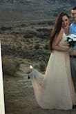 The dress fits great !! It is everything I looked for for my engagement pictures+ got to me super fast, highly recommended - Tal S.