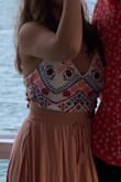 Love this top! I'd say it runs slightly large but thanks to the ties you can adjust as much as you want. Very pretty and fun top, makes me want to dance the night away on a beach every night! - Caylee C.