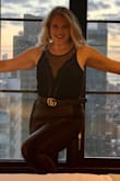 I love this bodysuit and have received so many compliments! I wore it a couple times now with leather leggings and jeans. I highly recommend! The first time you wear it the black does tend to rub off on your skin though, but after the first wash that goes away. - Lauren R.