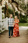 Being as short as I am I had to take a good portion of the dress off to wear it with flip flops in our engagement photos. I also had my seamstress sew in a clasp so I wouldn't worry about showing too much up top but it really wasn't necessary! The dress itself was so beautiful and so perfect for the day! - Cassandra H.