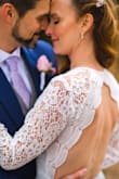 I absolutely loved this dress and received so many compliments. I had the sleeves taken in, as they fit a bit loose on my arms, but otherwise it fit perfectly. - Angela I.