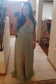 I was concerned about the color because I didn't think it would suit my olive skin but it did! I saw the sizing reviews and ordered a medium. Usually I am an Australian size 14 / L. It fits well. The only cons is that I will get it tailored because of the length and the cleavage! You'll need to get it tailored if you're under 5'4 because it's long. The slit along the leg also ends just above my knee so I'll be cutting it higher. I will also be reducing the amount of boob I see because it even showed the rib bit of my bra! Overall, it's a lovely dress! The fabric is perfect for all seasons. It's not itchy (and I have eczema) and it flows perfectly. The fabric is heavy so it wouldn't blow away too much in the wind. If you're not American just prepare yourself for the exchange rate! - Audrey M.