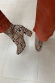 The are definitely true to size. I ordered a 6.5 which is my standard size and they fit great! So cute! I also love how they don't gap around the top, they fit snug! There is nothing worse than people being able to see down your boot or having the boot look to big because of the gapping. Which is not the case with these! I would highly recommend these boots! - Jacquelyn S.