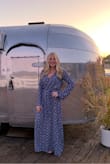 Dress definitely runs big, I never buy anything in an XS, more like a small or medium typically but this fit perfectly! - Emma B.