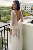 This dress was everything I had hoped for! I received compliments the entire night. The only downside to the dress (and the reason I won't give 5 stars) was due to the crazy amount of glitter that rubs/falls off of it. Other than that, loved it. - Kristen A.