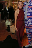 I wore this jumpsuit to my husband's company's holiday party and received so many compliments on it at the party and on social media after. I did have it tailored for length, and an extra clasp added at the lower back to keep the sides from gaping open and revealing anything. Love love love! I wore this again for a wedding, too. - Holly S.