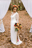I ordered this dress on a whim after a last minute decision to elope. The dress fit perfect and it's beautiful in person! It could definitely compete with bridal store quality. I got so many compliments after we released our wedding photos. - Kelsey Y.