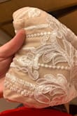 I will wear this as my wedding dress. I think the material is perfect, it seems so much more expensive than it really is! It does run small, I would normally wear a medium in Lulus or any other brand, but I chose to size up since it was final sale. It does fit me, but I will have it taken in, in a couple of places, since I want it to be perfect for my wedding day. (strap in the first picture is my bra strap) - Kayla W.