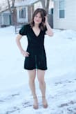 The top was very loose and low cut on me. I'm a 34B and had to get it taken in or my bra was showing. I'm short and it's still VERY short. I chose not to wear anything underneath but probably should have. Overall, very cute and flattering dress. Super sexy. - Sarah B.