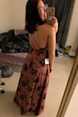 Love the dress. It's very trendy and unique. The top runs a smidgen small, but I can still wear it! Bought it to wear to my friends bridal shower. - Meagan H.