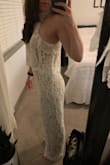 SUCH a gorgeous jumpsuit! Got this for my sister in law's boho beach wedding and it is perfect for the occasion. Would be great for many other events as well! Fits very well, I typically am a Small but sized up to a Med based on reviews and am glad I did to get extra torso length. 5'7, 136lbs, athletic build. It is a tiny bit loose in the bust/ribcage area but not enough to warrant any tailoring, it looks beautiful as is and is so comfortable. The detailing on the eyelash lace is beautiful! - Brittany F.